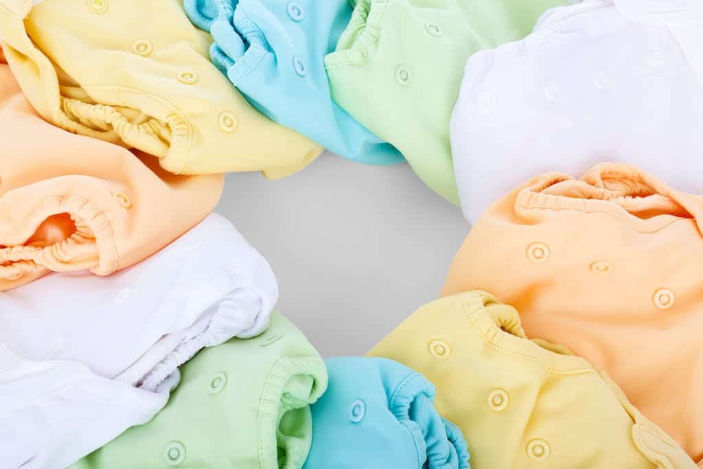 White orange yellow blue cloth diapers in a circle